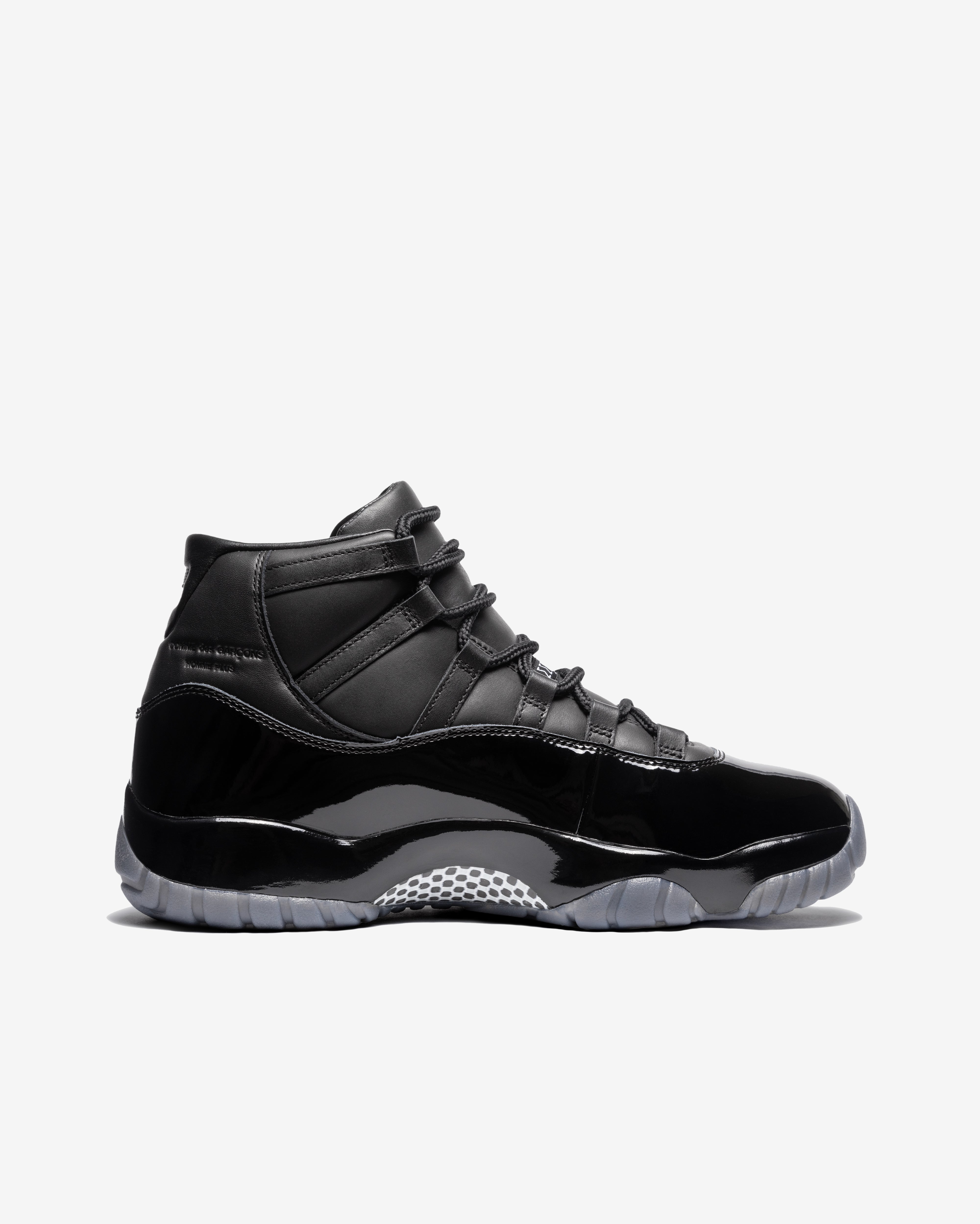 Comme des Garçons Homme Plus: Nike Air Jordan 11 (Black) | DSMNY E
