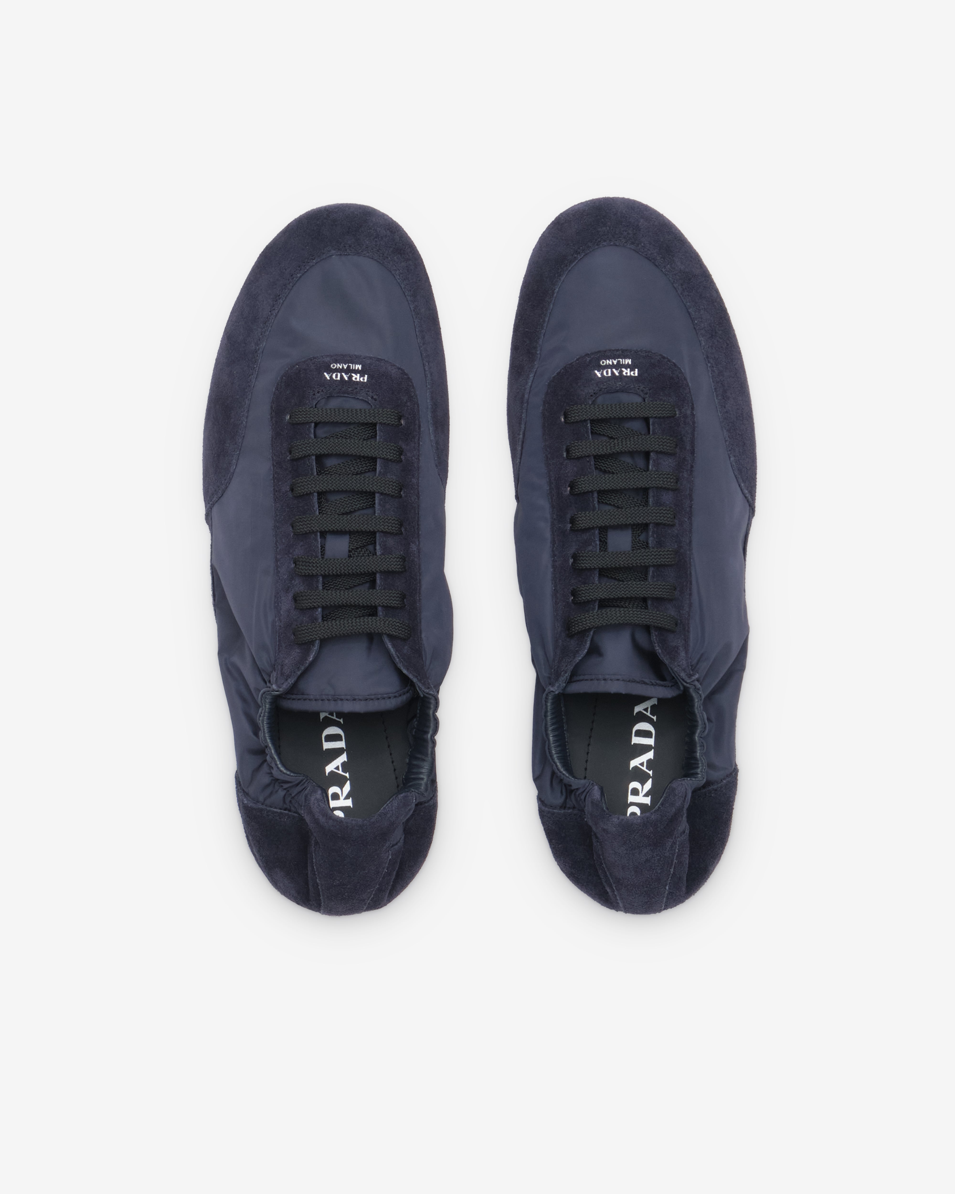 Prada: Men's Collapse Re-Nylon Elasticized Sneakers (Blue) | DSMNY