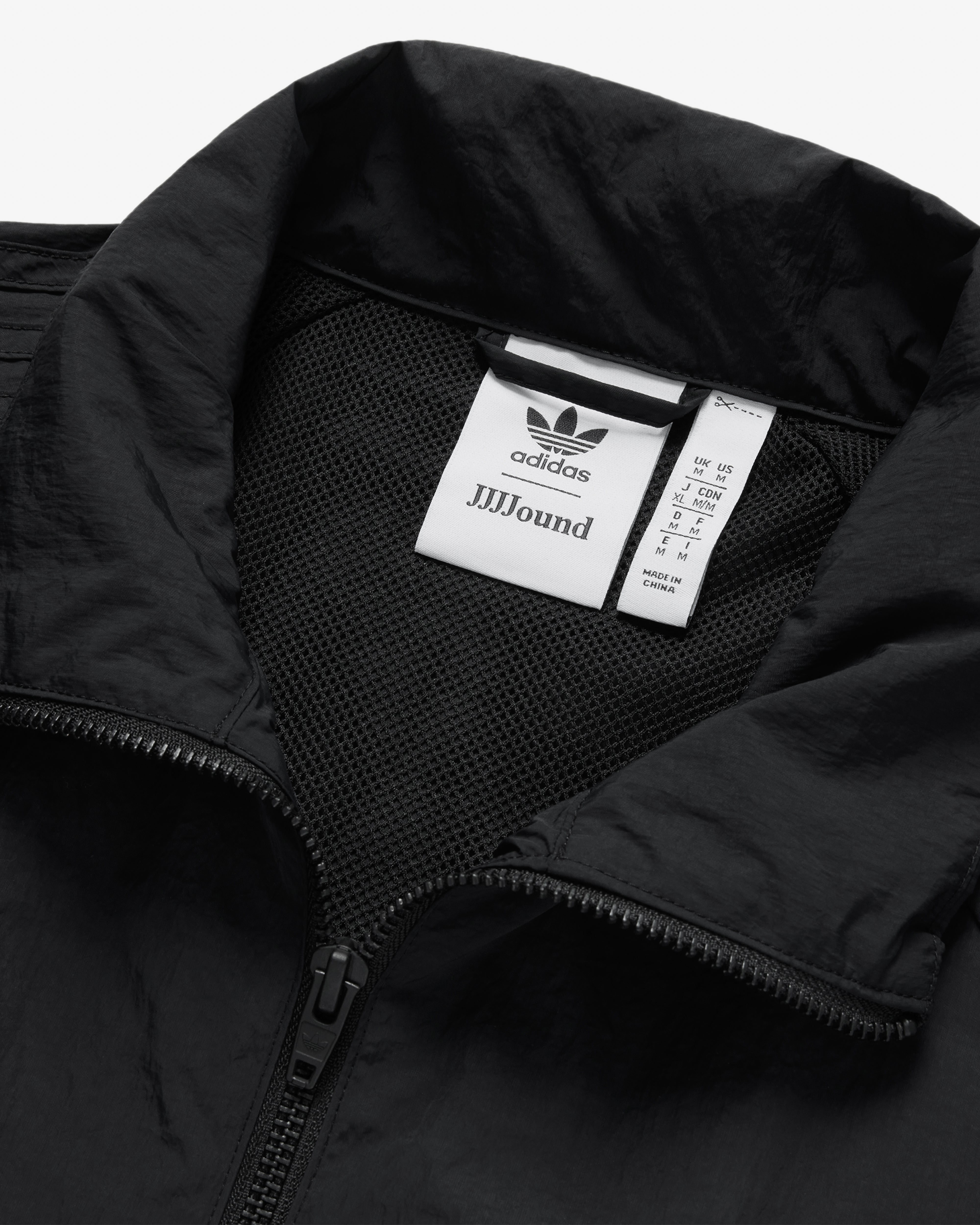 Adidas: Men's JJJJound Tracktop (Black) | DSMNY E-SHOP