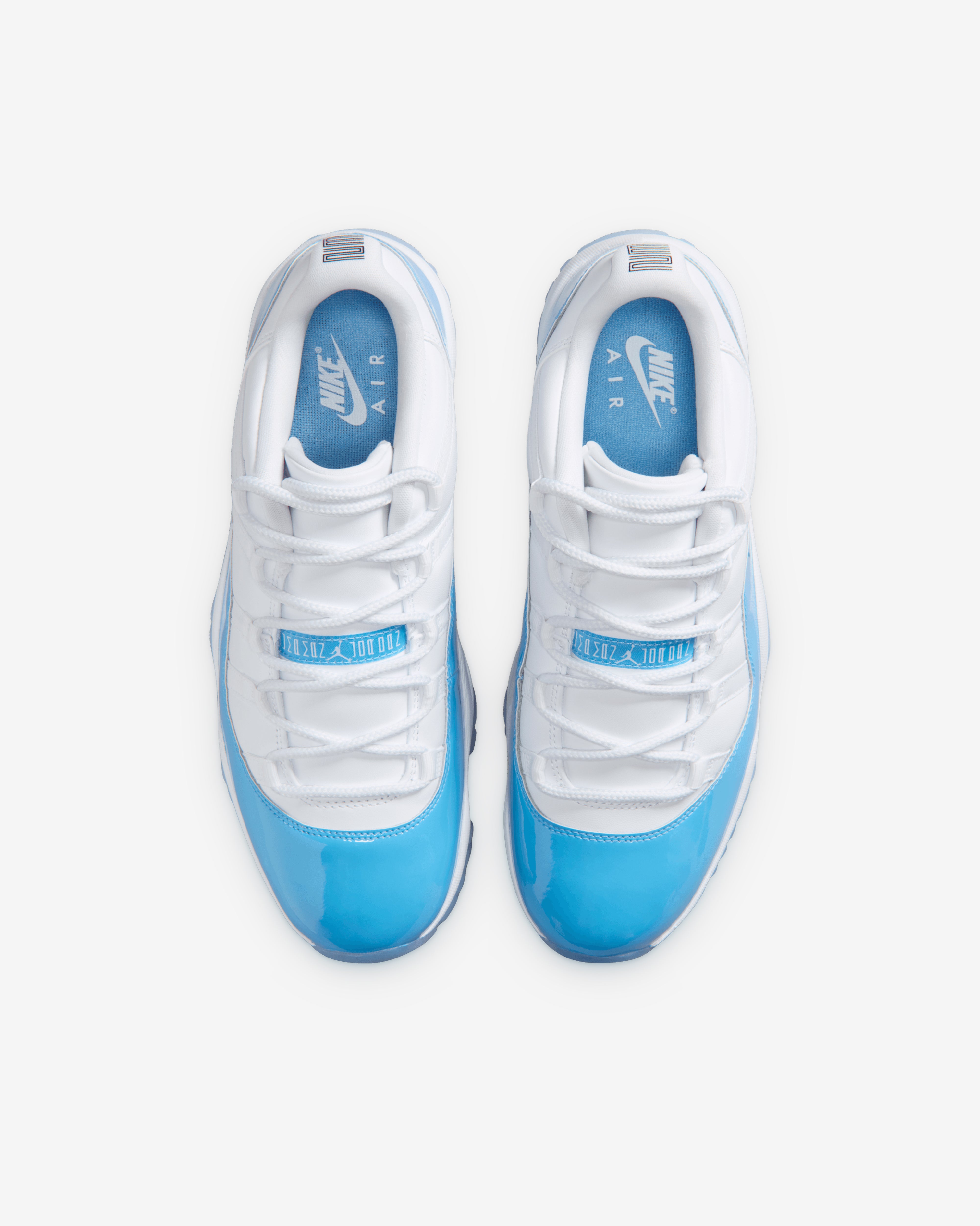 Nike: Men's Air Jordan 11 Retro Low Sneakers (White/University
