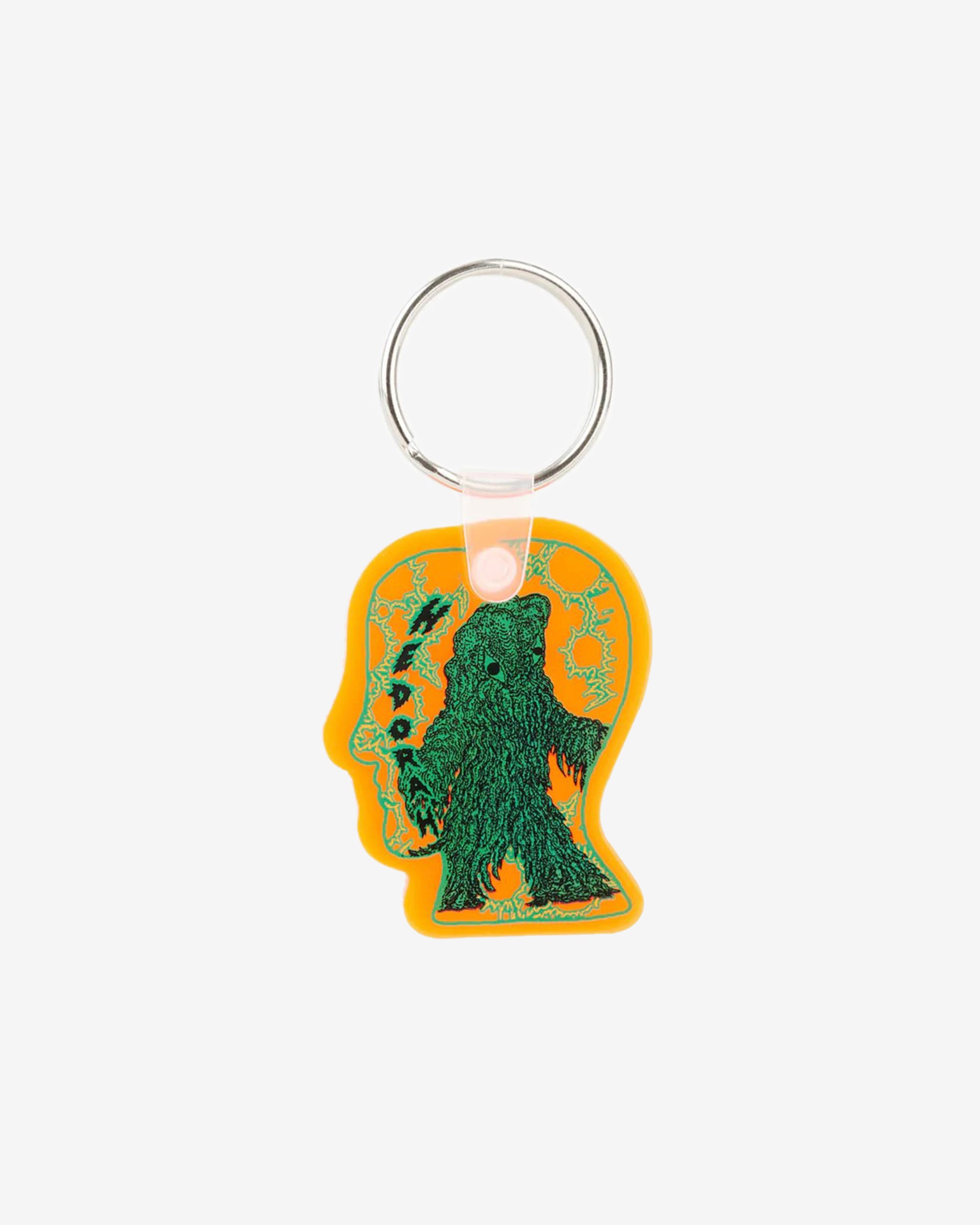 Brain Dead x Godzilla - Hedorah Logohead Keychain - (Clear Orange) view 1, Click to Zoom in
