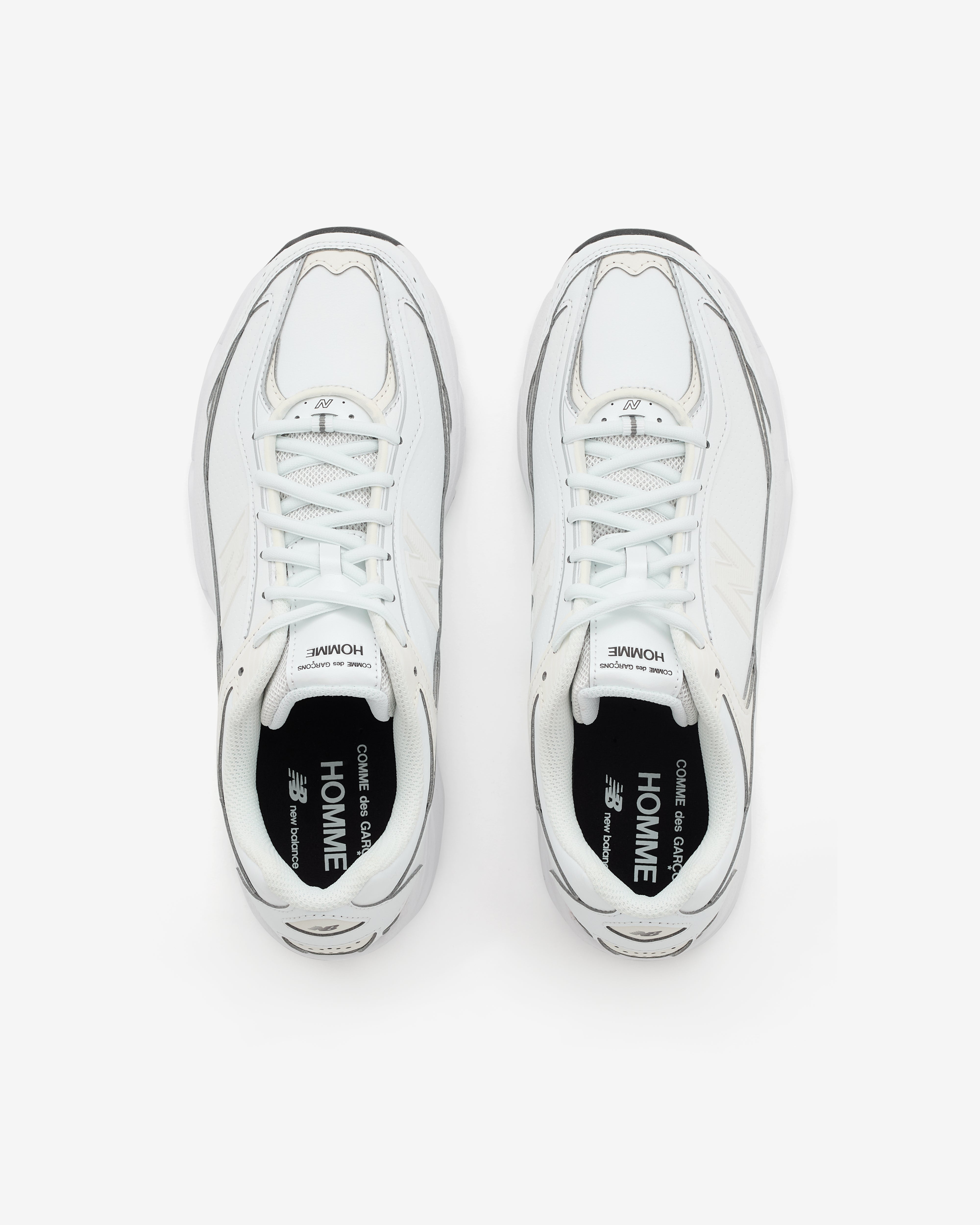 CDG Homme: Men's New Balance 509 Sneakers (White) | DSMNY E-SHOP