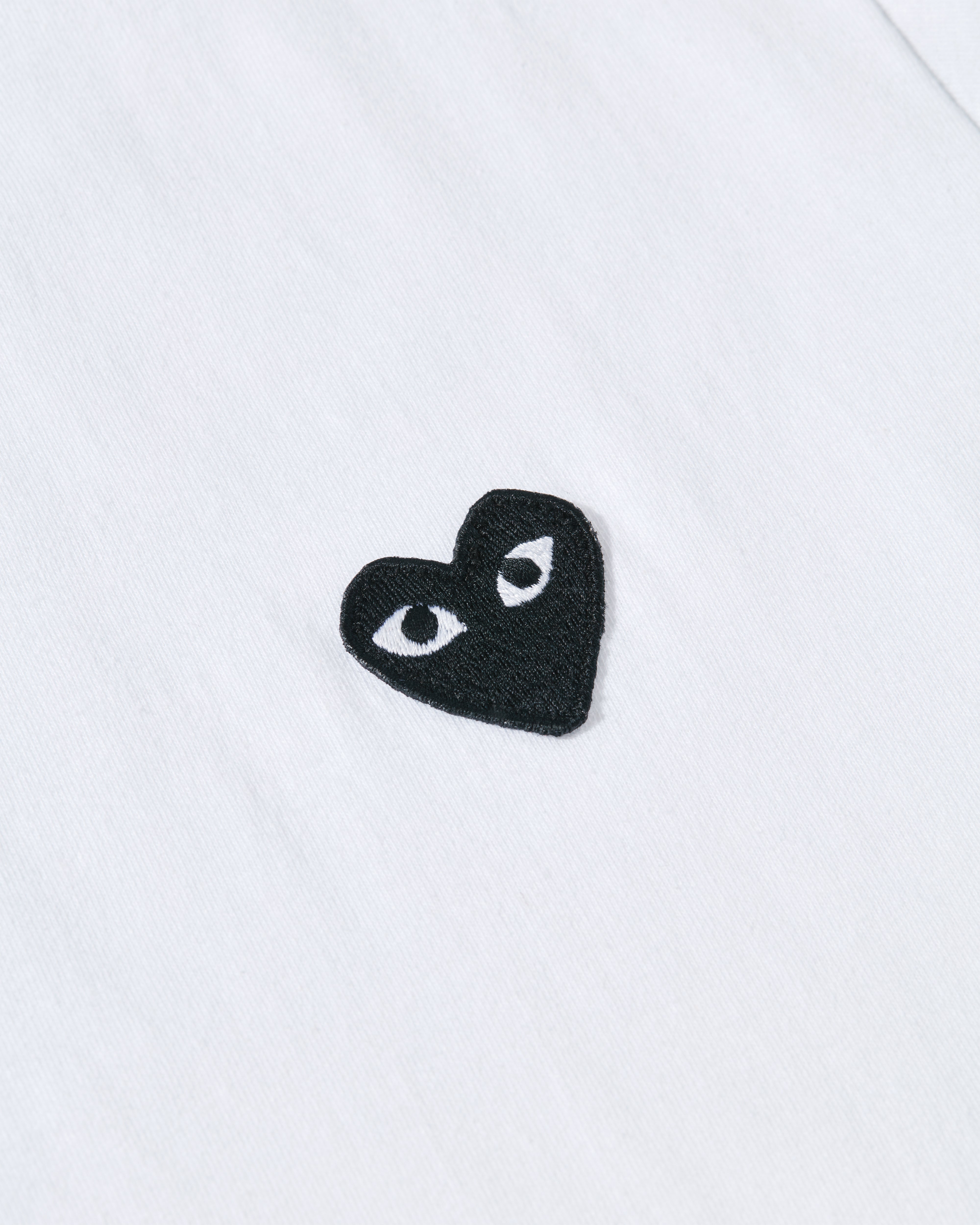 Play Comme des Garçons: Black T-Shirt (White) | DSMNY E-SHOP