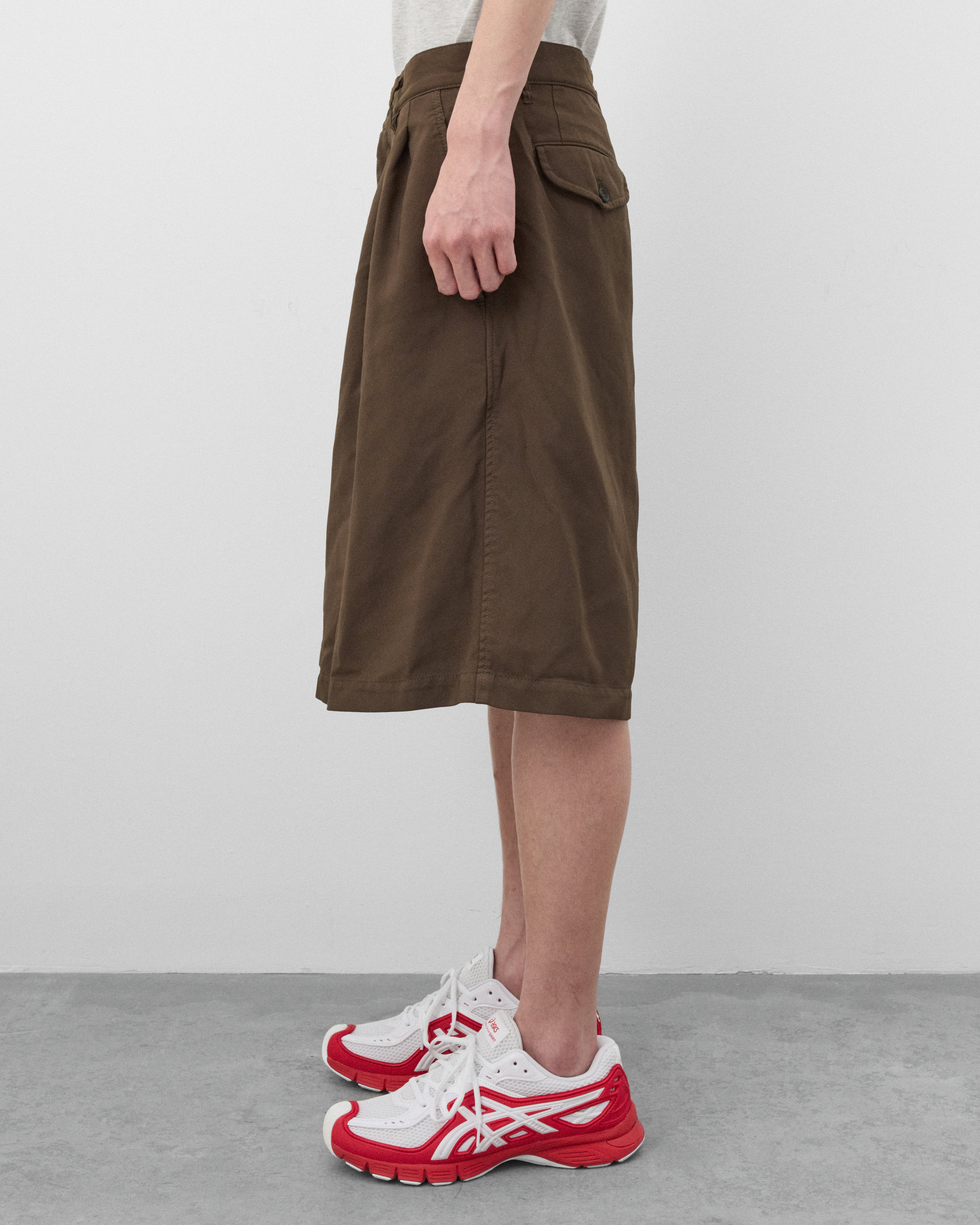 CDG Shirt: Men's Pleated Wide Leg Shorts (Olive) | DSMNY E-SHOP