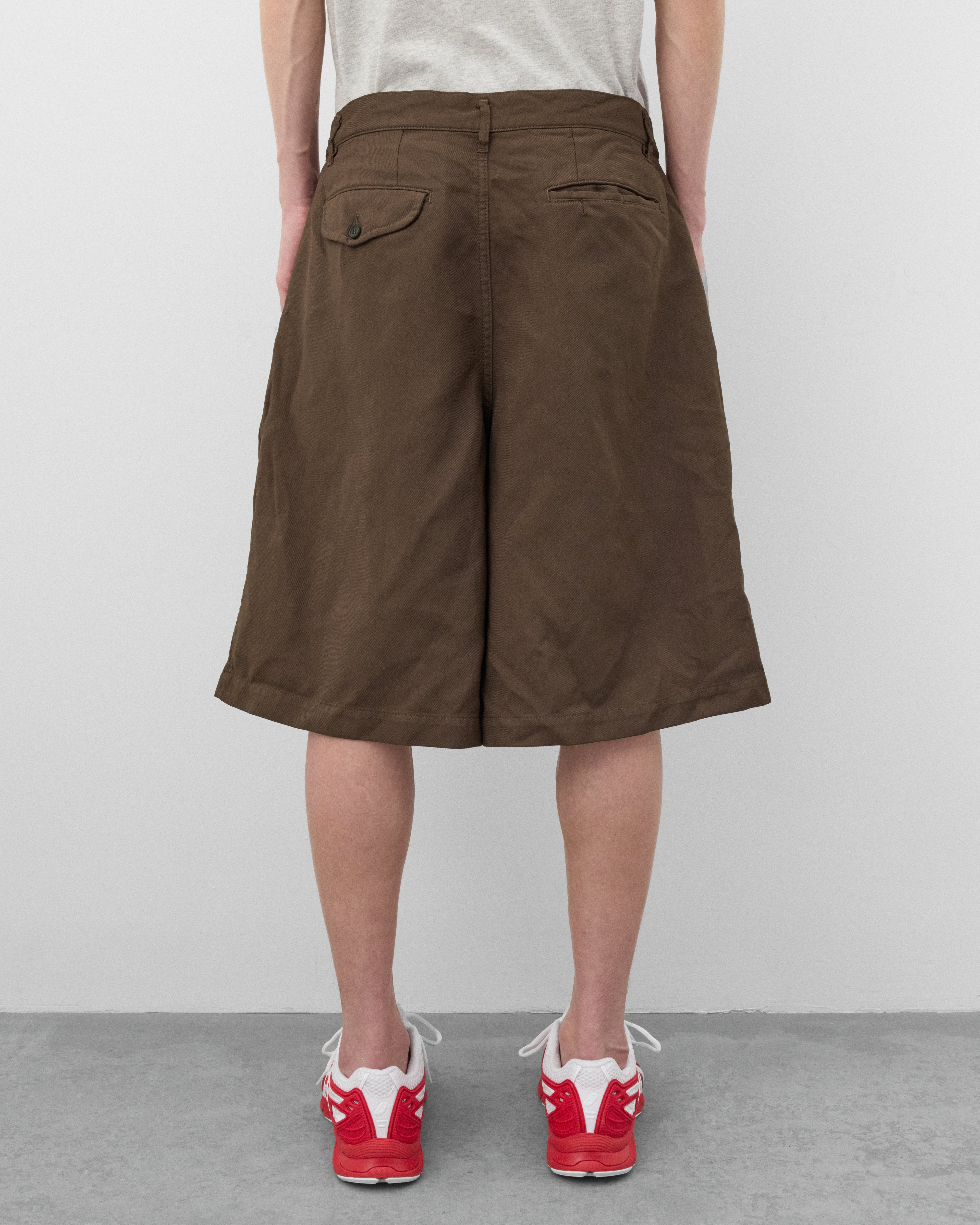 CDG Shirt: Men's Pleated Wide Leg Shorts (Olive) | DSMNY E-SHOP
