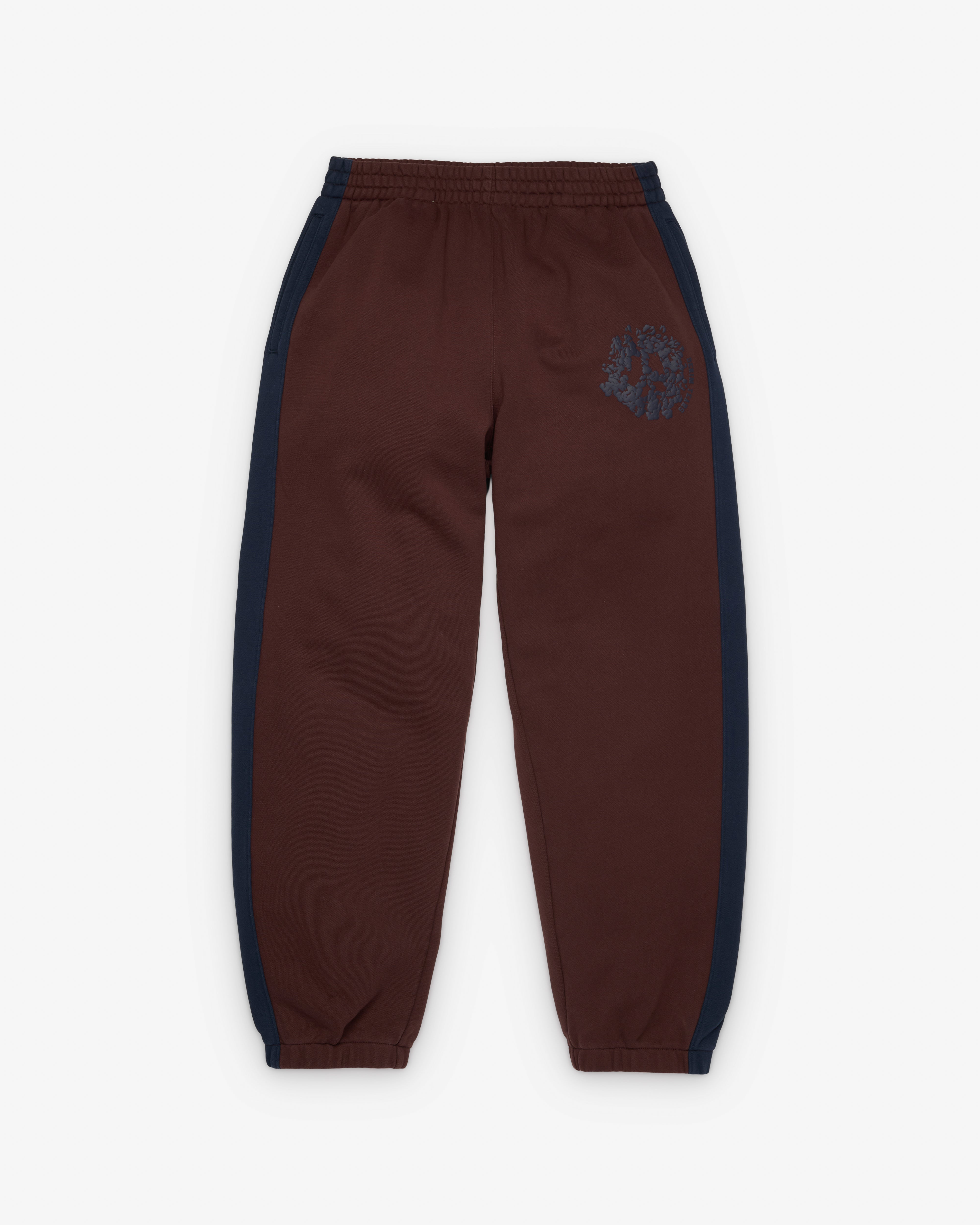 Denim Tears: Men's Denim U Paneled Sweatpants (Brown) | DSMNY E-SHOP