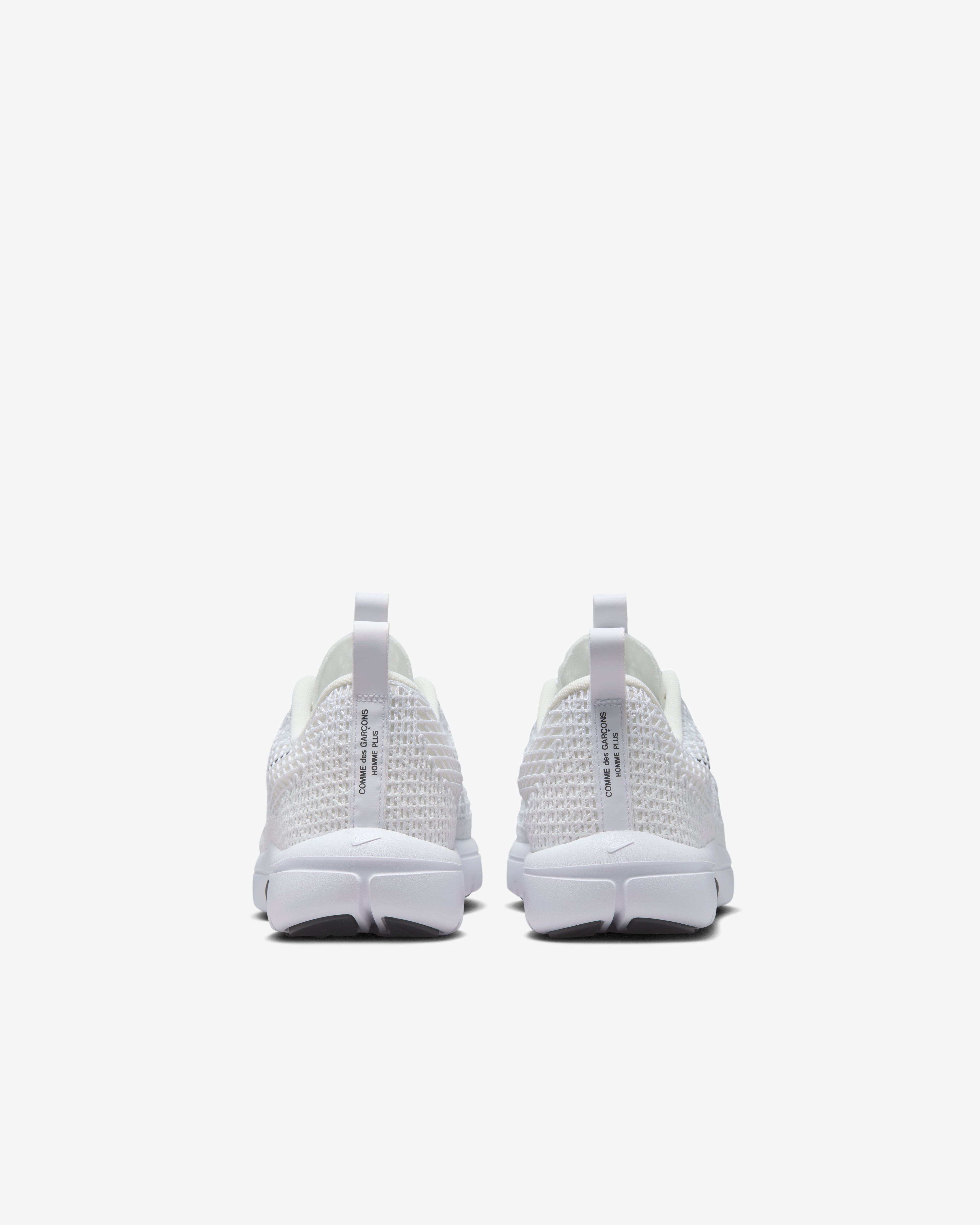 Umee Comme des Garçons: Nike Men's Rejuven8 Sneakers (White) | DSMNY E-SHOP
