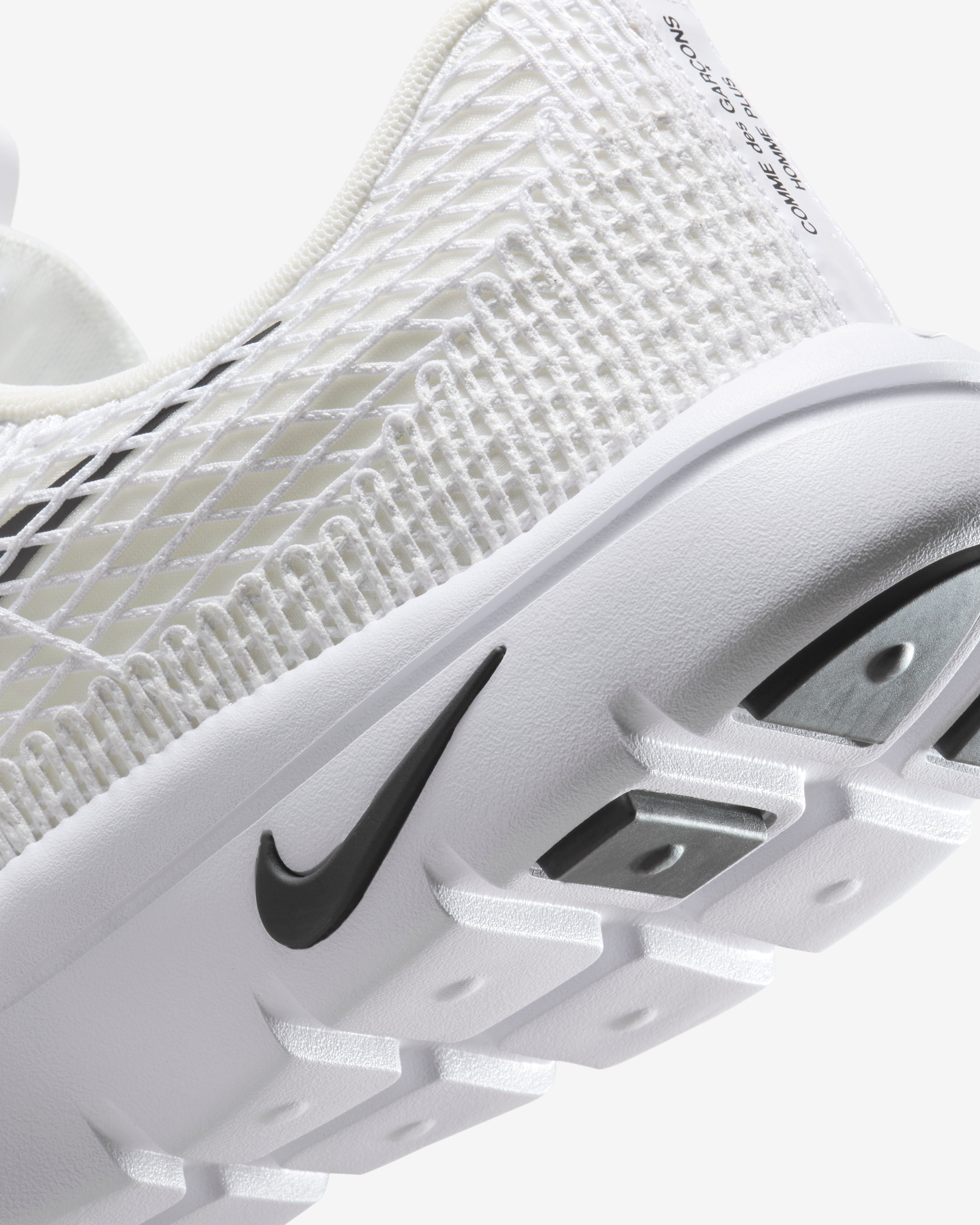 Comme des Garçons: Nike Men's Rejuven8 Sneakers (White) | DSMNY E-SHOP