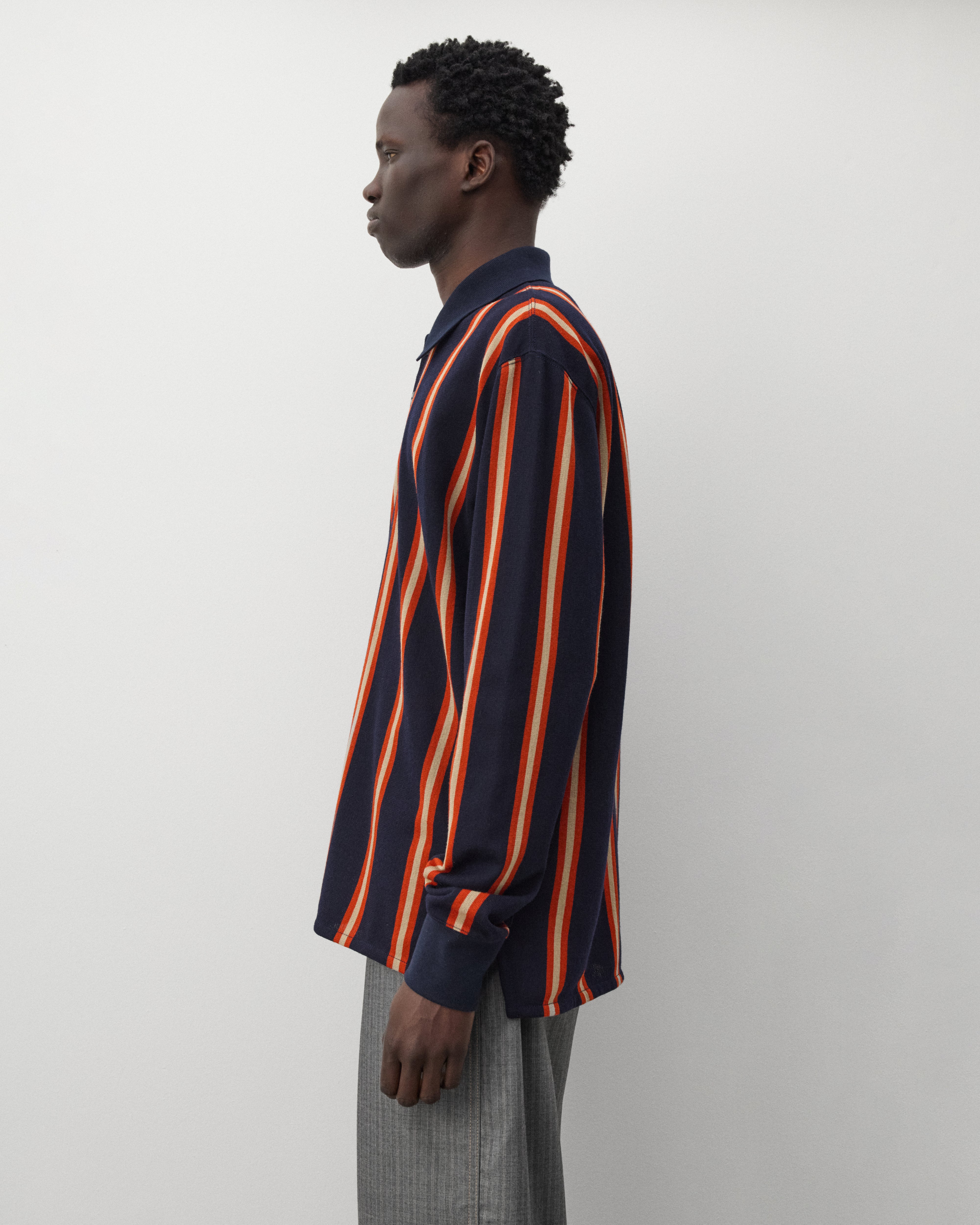 Junya Watanabe Man: Men's Striped Knit Polo (Navy/Orange) | DSMNY