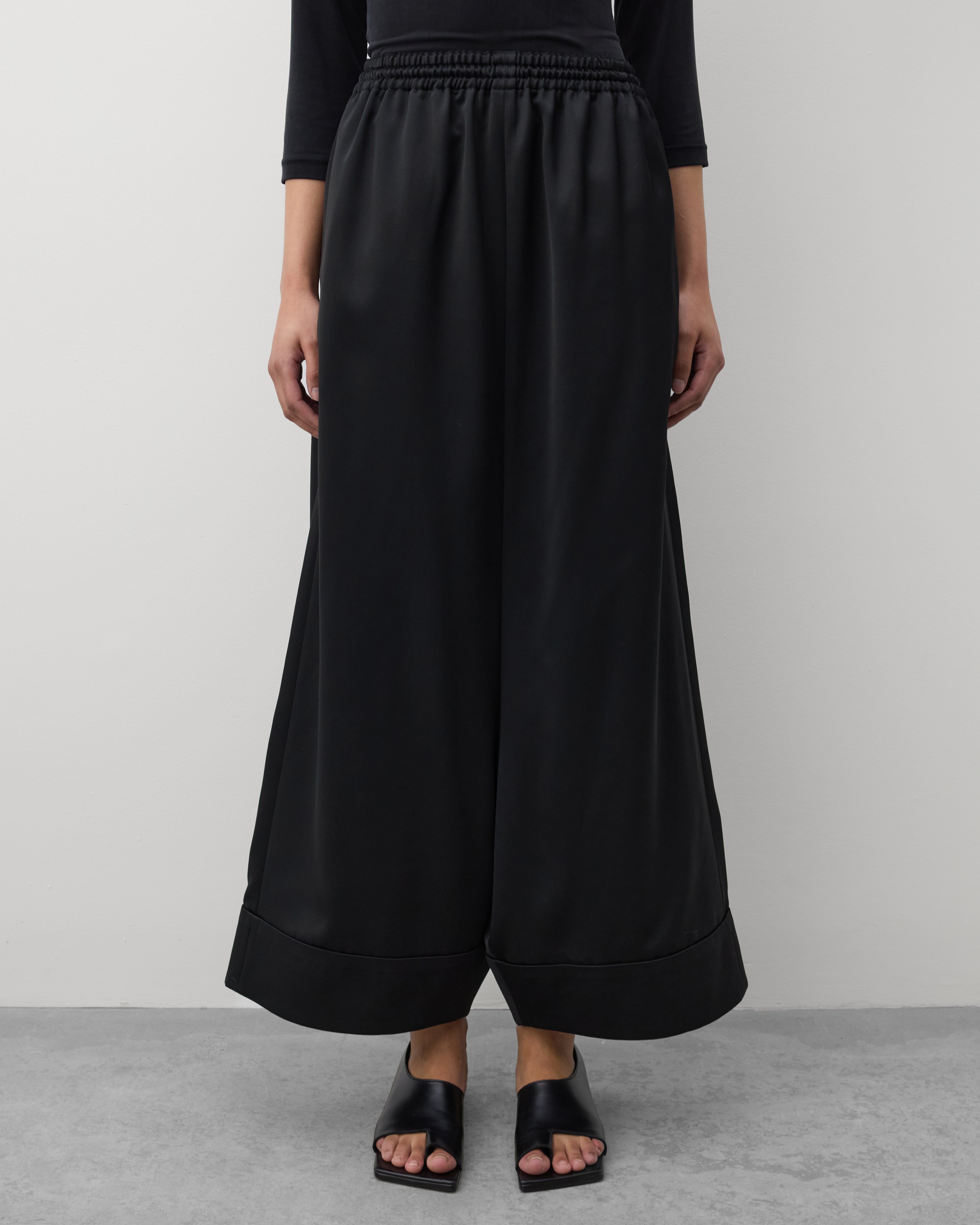 Junya Watanabe: Women's Wide Leg Cuffed Trousers (Black) | DSMNY E