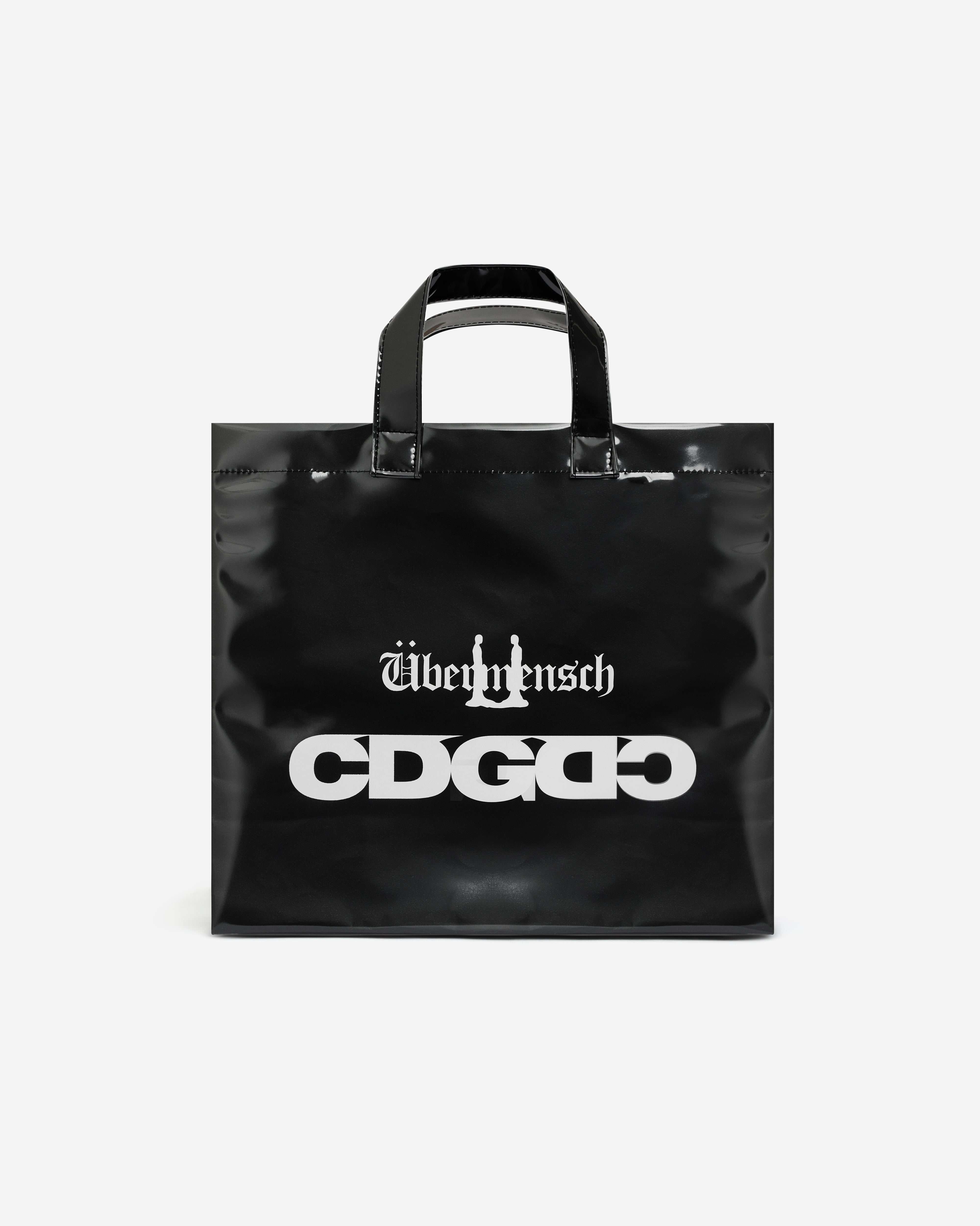 CDG: G-DRAGON Übermensch PVC Tote Bag (Black) | DSMNY E-SHOP