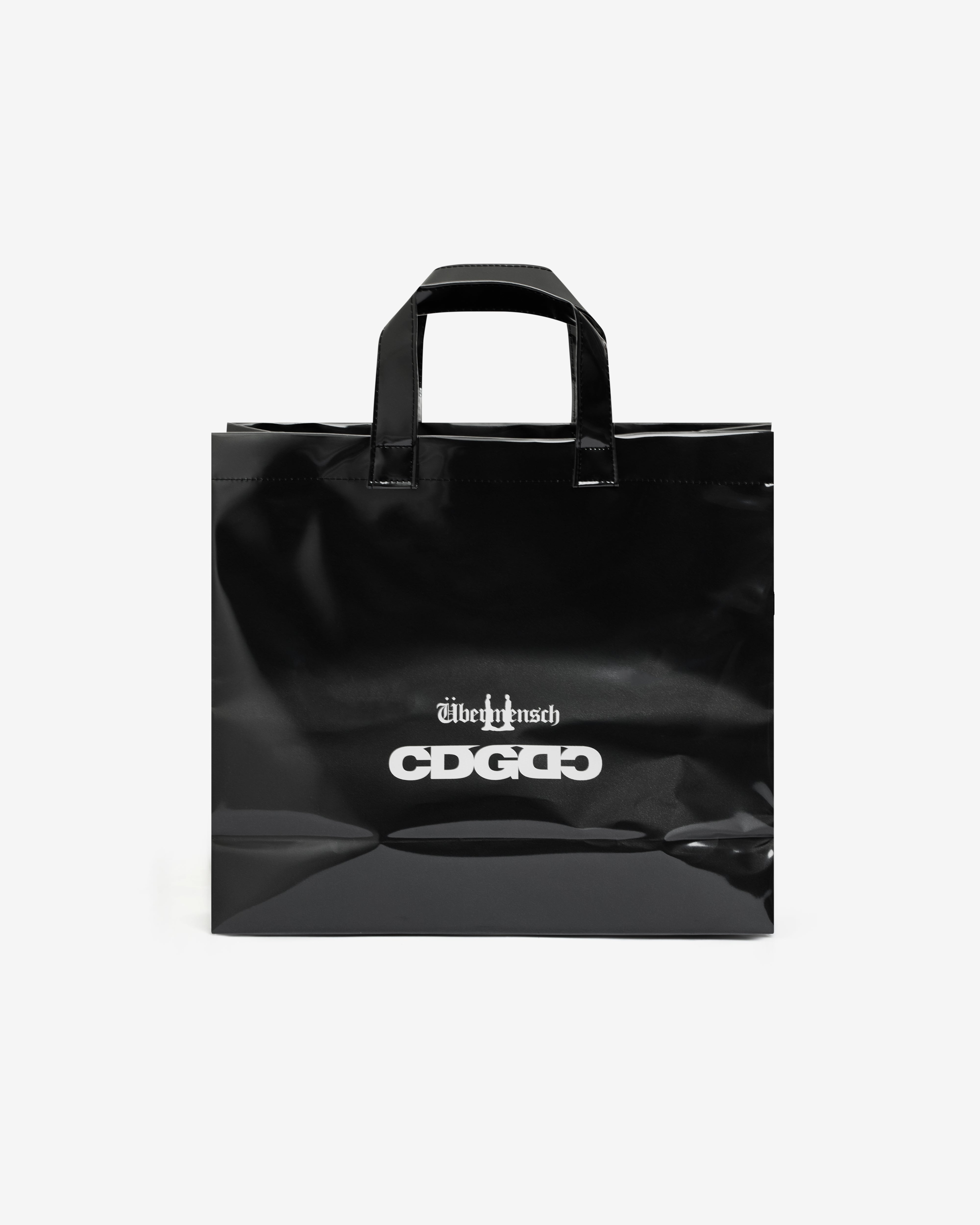 CDG: G-DRAGON Übermensch PVC Tote Bag (Black) | DSMNY E-SHOP