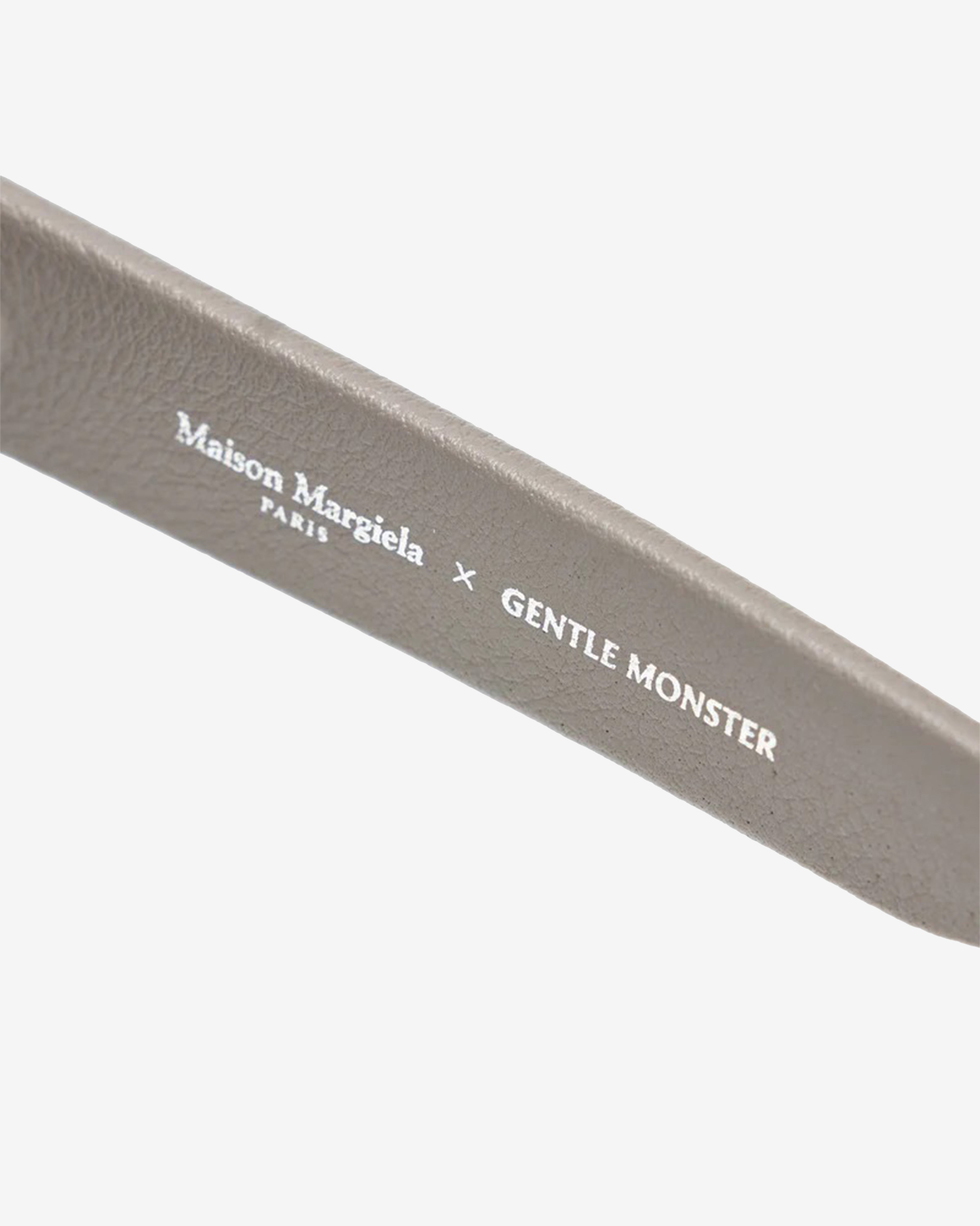 Gentle Monster: MM107 Leather-lk1 Sunglasses (Taupe) | DSMNY E-SHOP