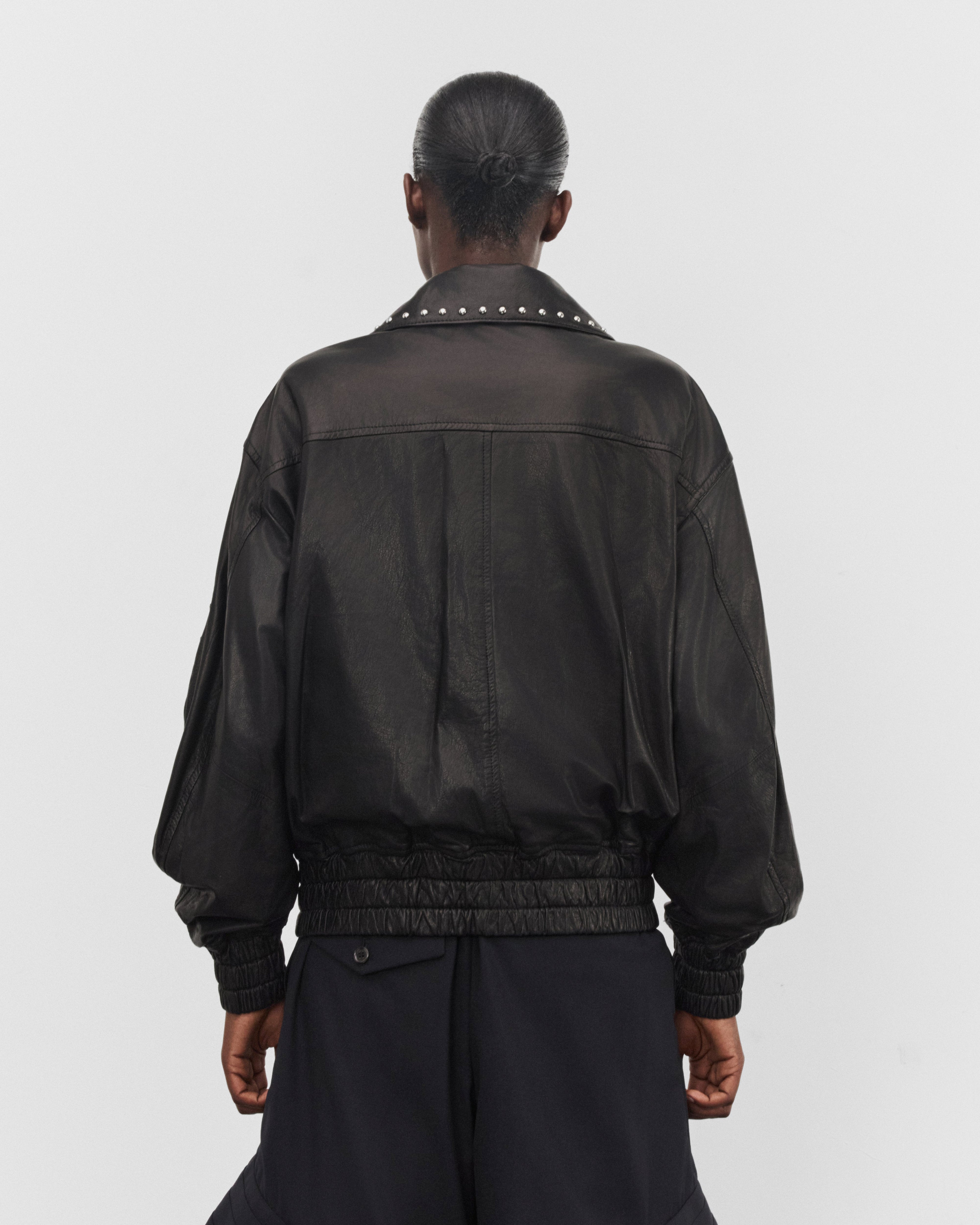 Noir Kei Ninomiya: Women's Studded Leather Jacket (Black) | DSMNY