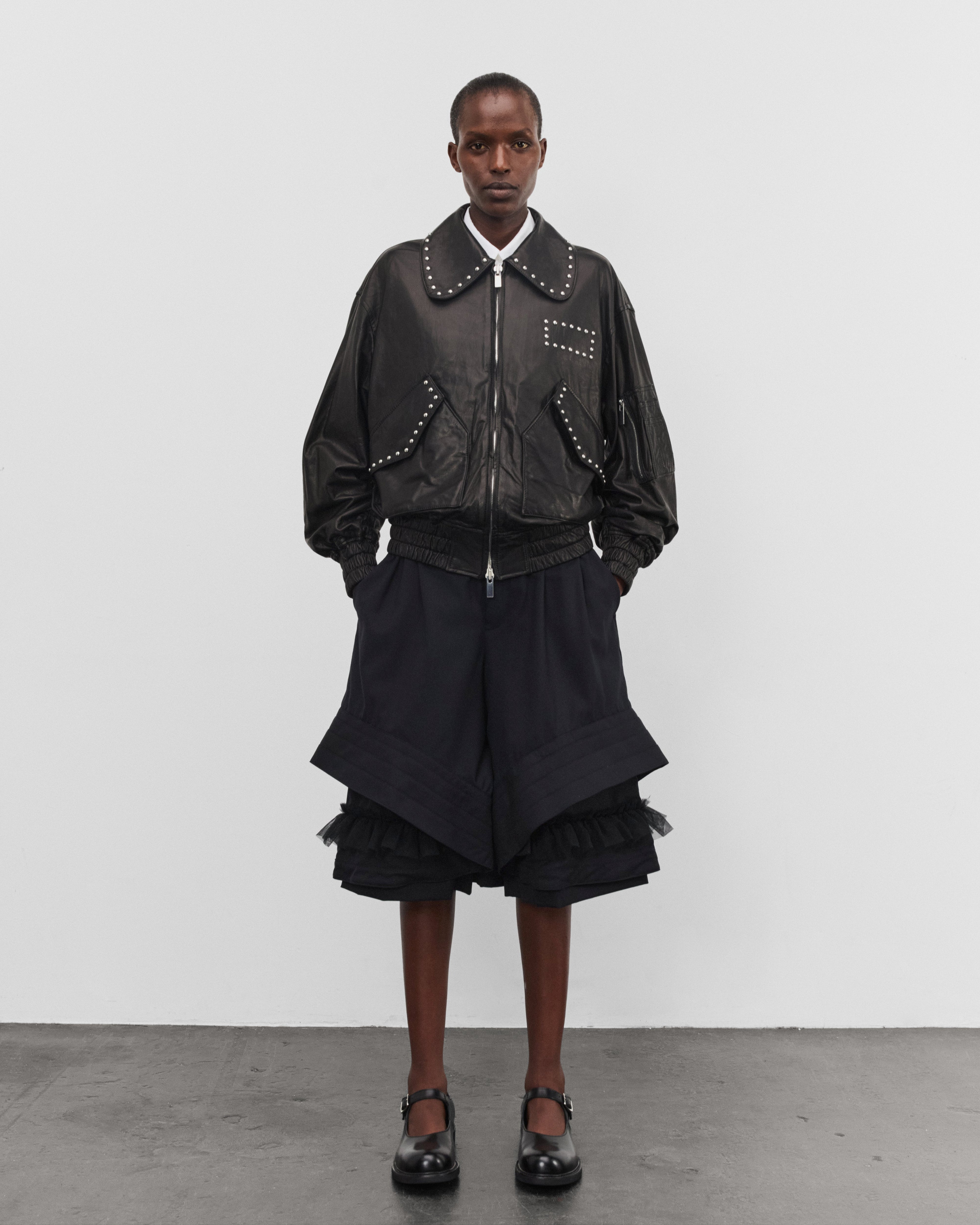 Noir Kei Ninomiya: Women's Studded Leather Jacket (Black) | DSMNY