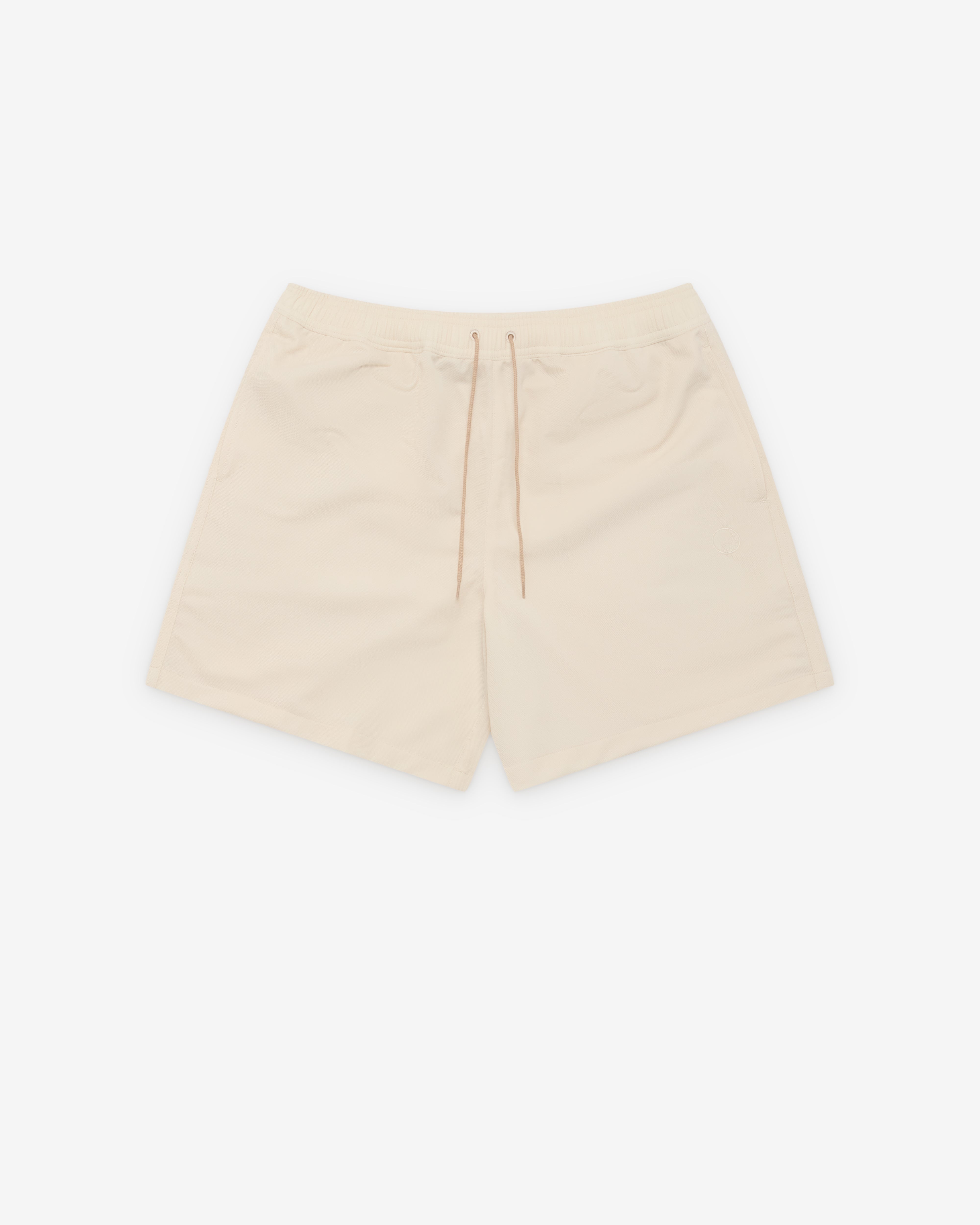 Our Legacy Work Shop: Men's Sports Shorts (Beige) | DSMNY E-SHOP