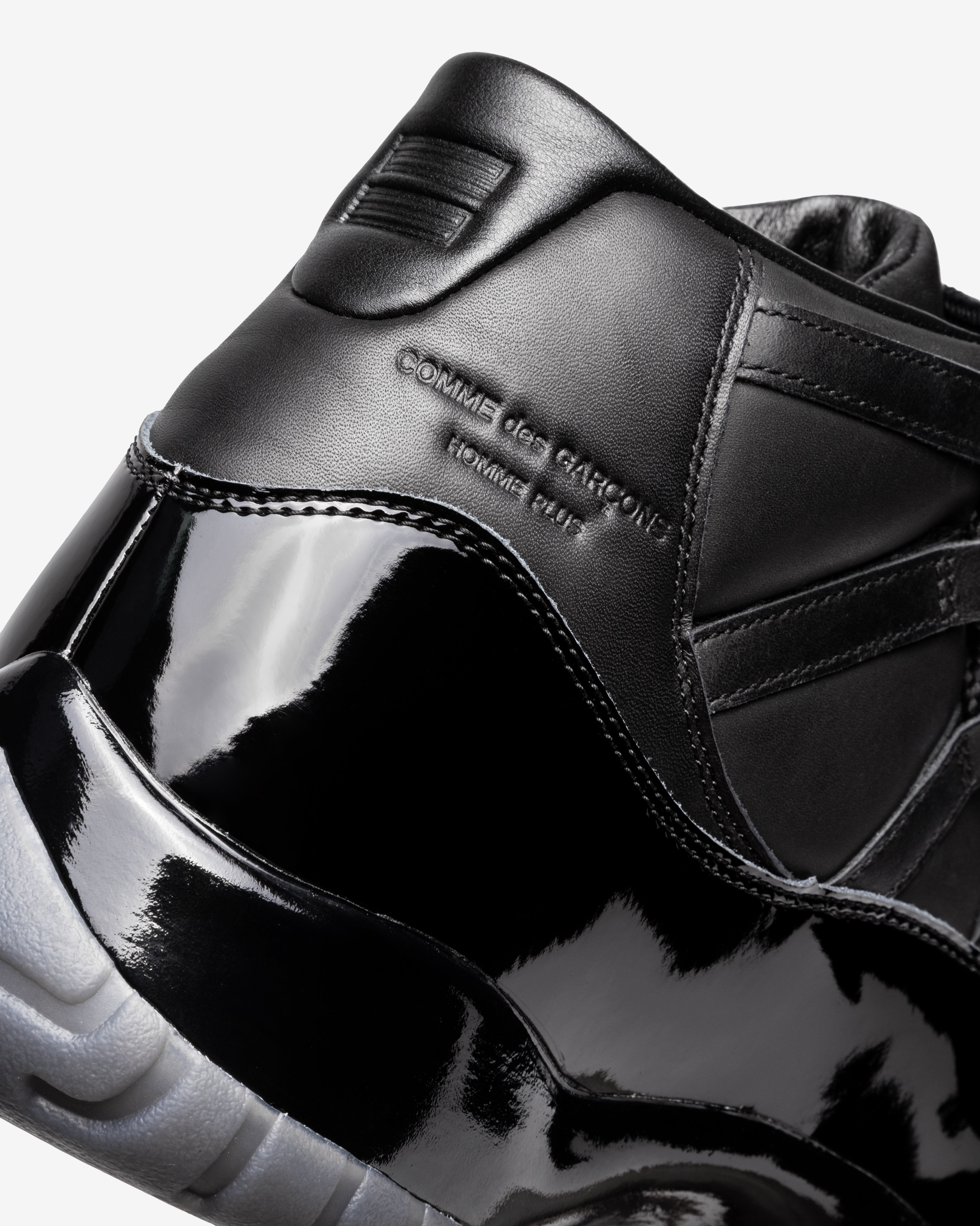 Comme des Garçons Homme Plus: Nike Air Jordan 11 (Black) | DSMNY E