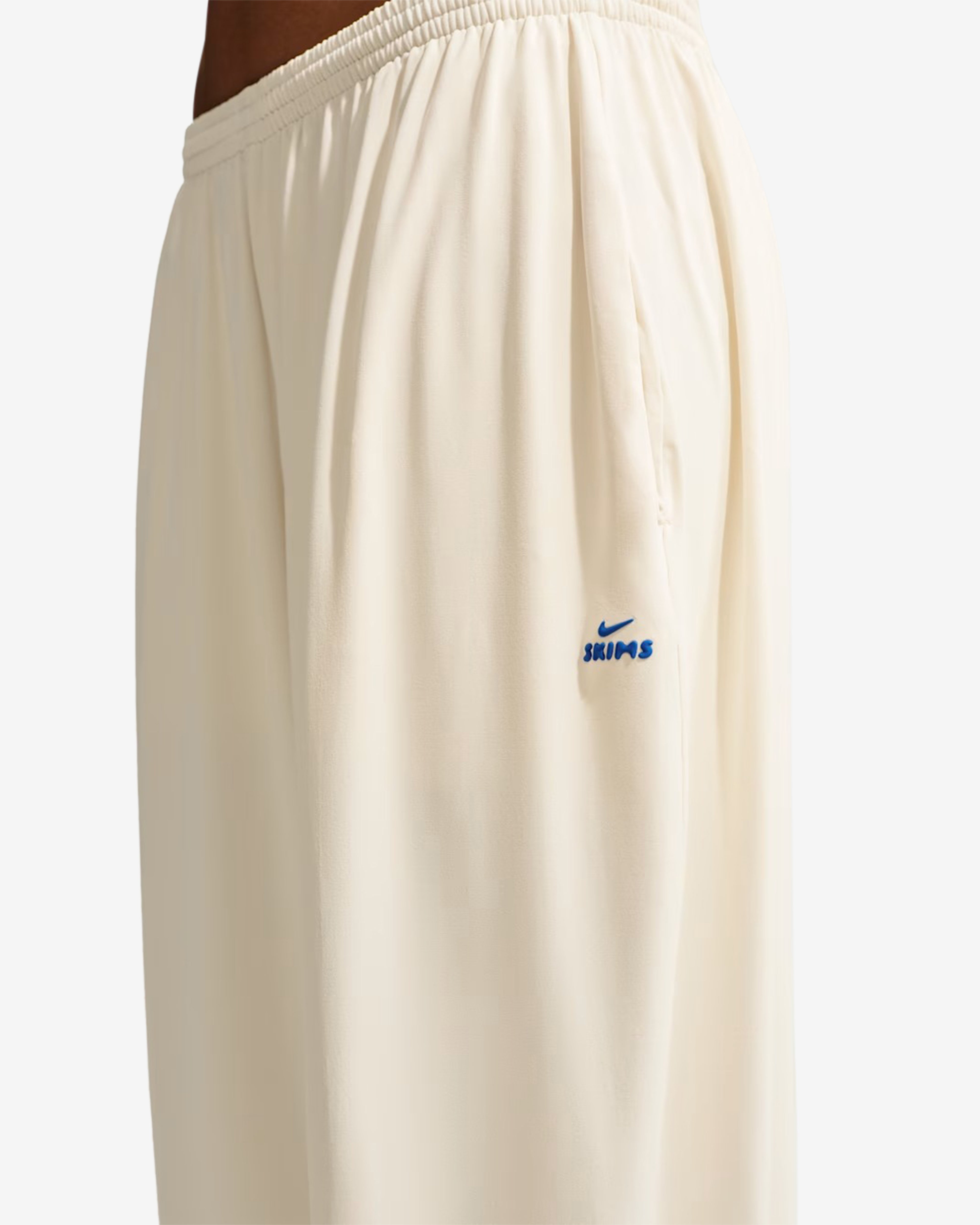 NikeSKIMS: Women's Stretch Knit Pants (Ivory/Cobalt) | DSMNY E-SHOP