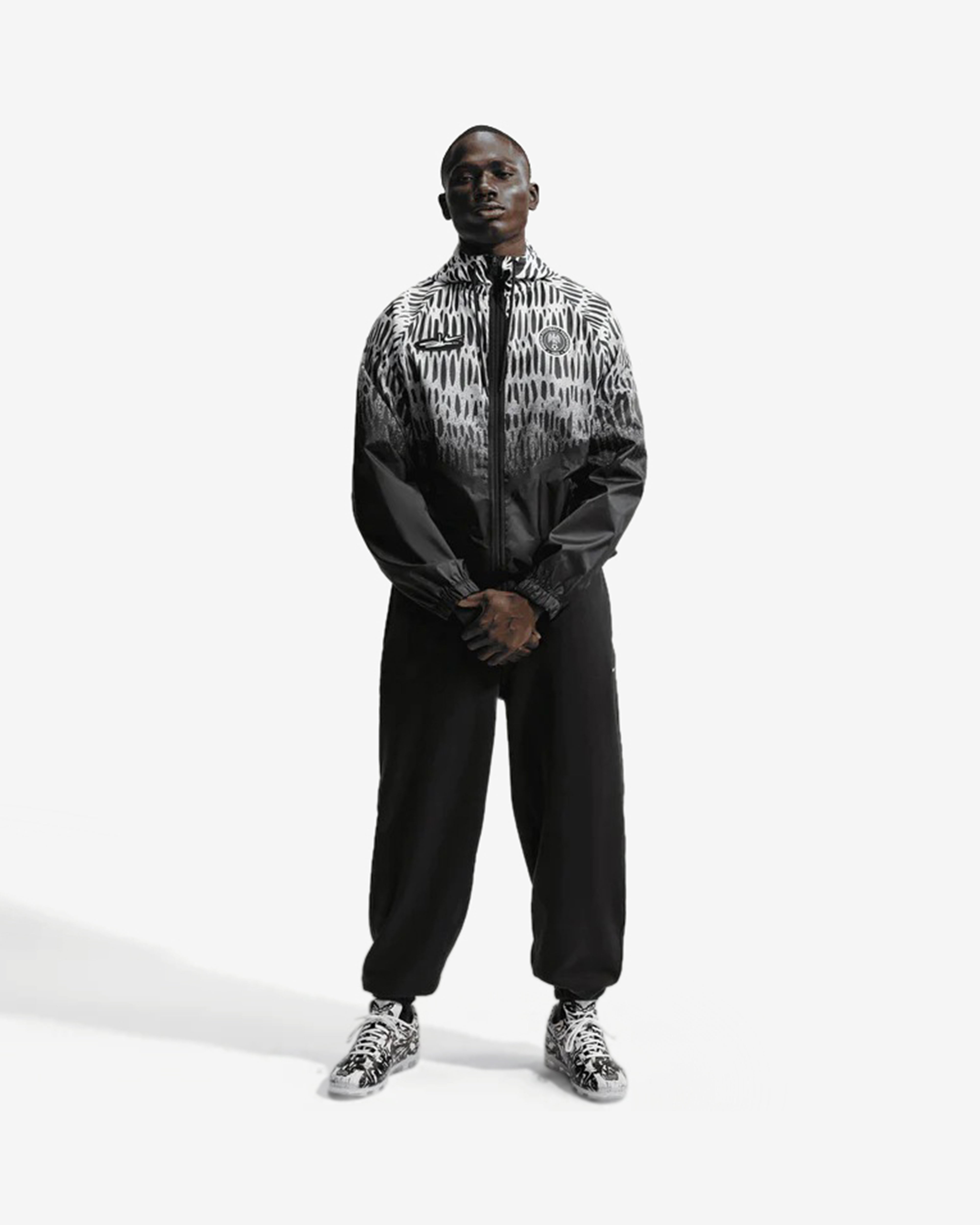 NEC ナイメヘン トラックジャケット Nijmegen Nike: Men's Slawn X Nigeria Anthem Jacket (Black/White) | DSMNY E-SHOP